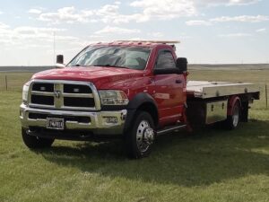 Red tow truck equipped for light and medium-duty towing